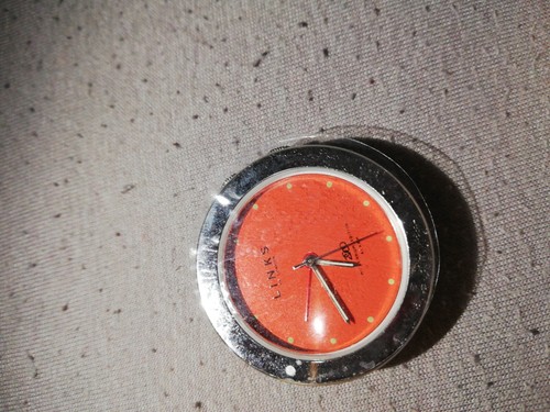 Links round travel alarm clock - round,