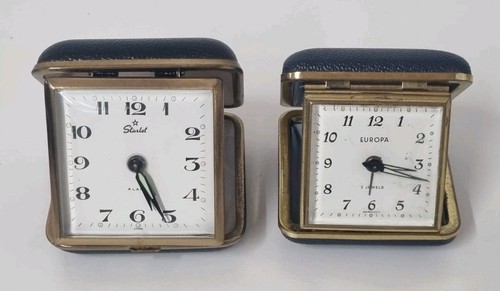 Travel alarm clocks - x,
